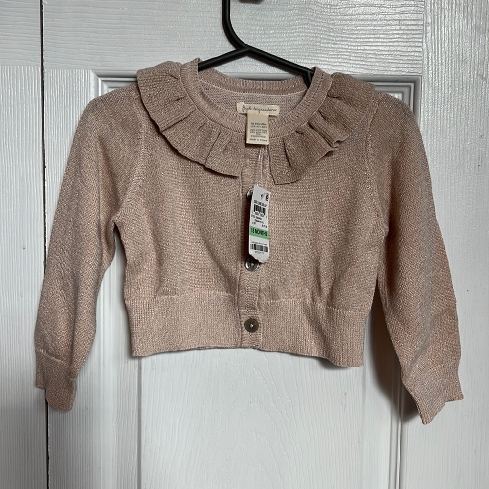 Baby girl cardigan sweater. Tan color with a sparkle to it